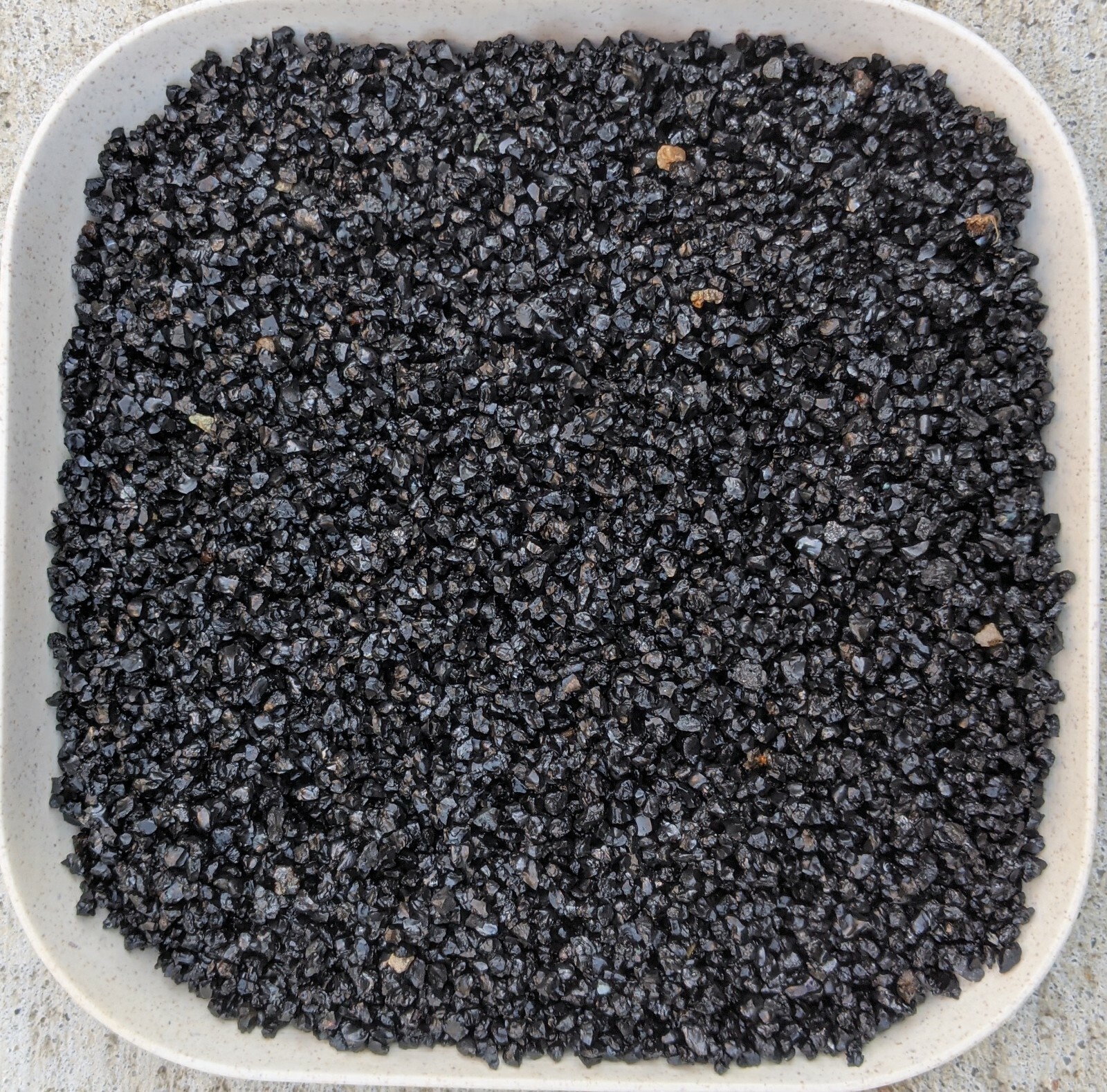 Natural shiny coarse black sand