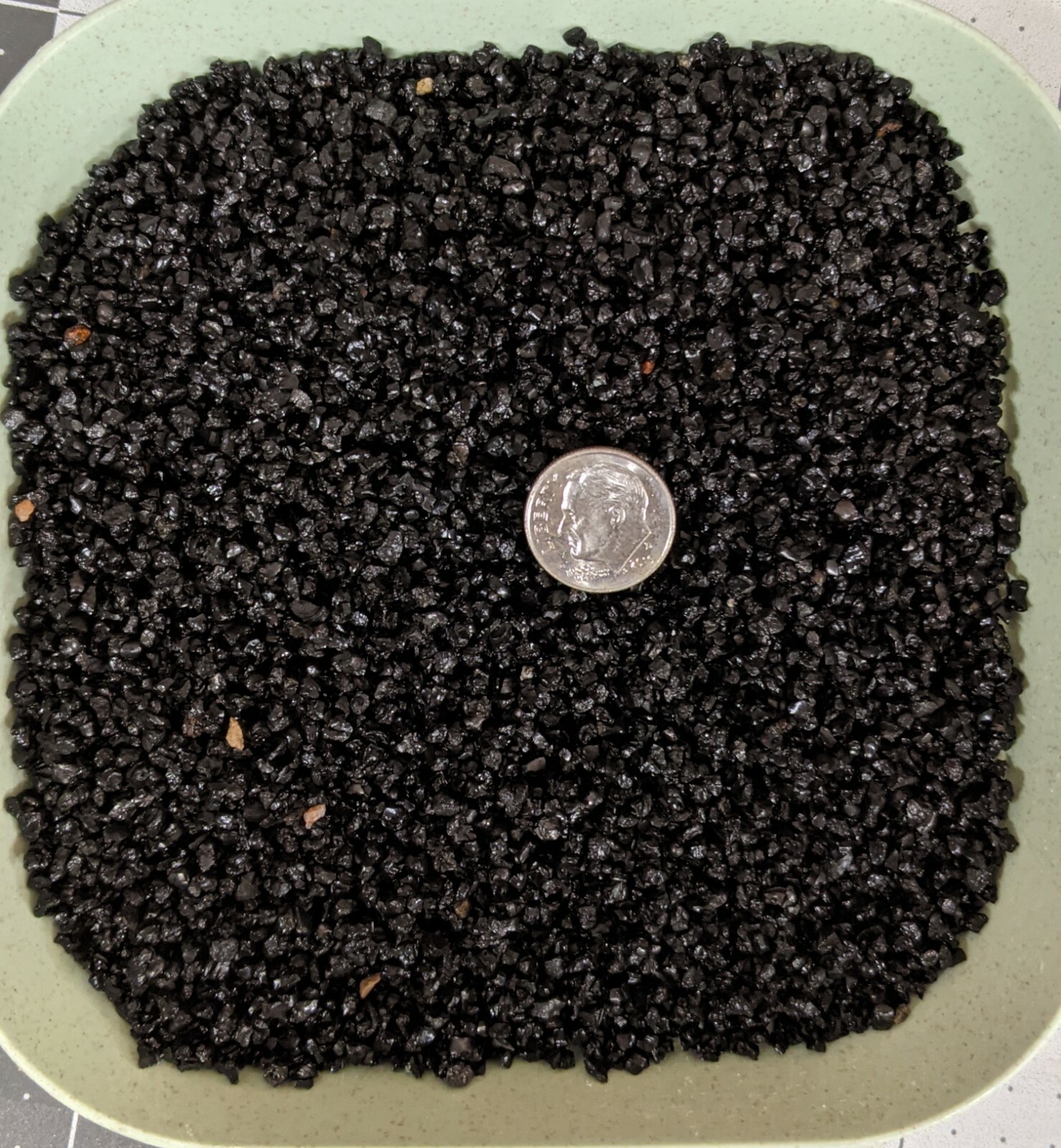 Natural shiny coarse black sand