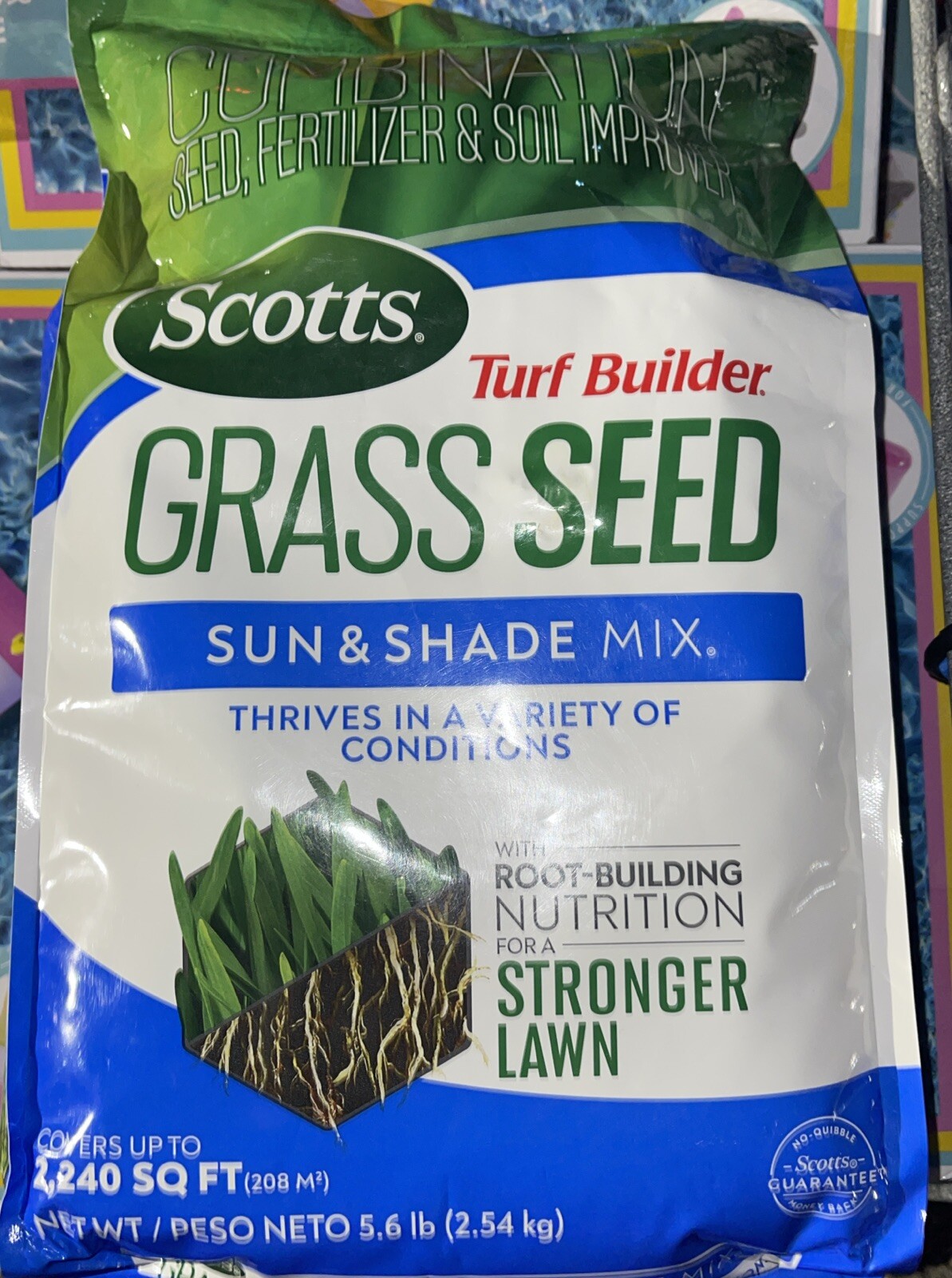 Turf Builder Grass Seed Sun & Shade Mix with Fertilizer and Soil 5.6 Lbs